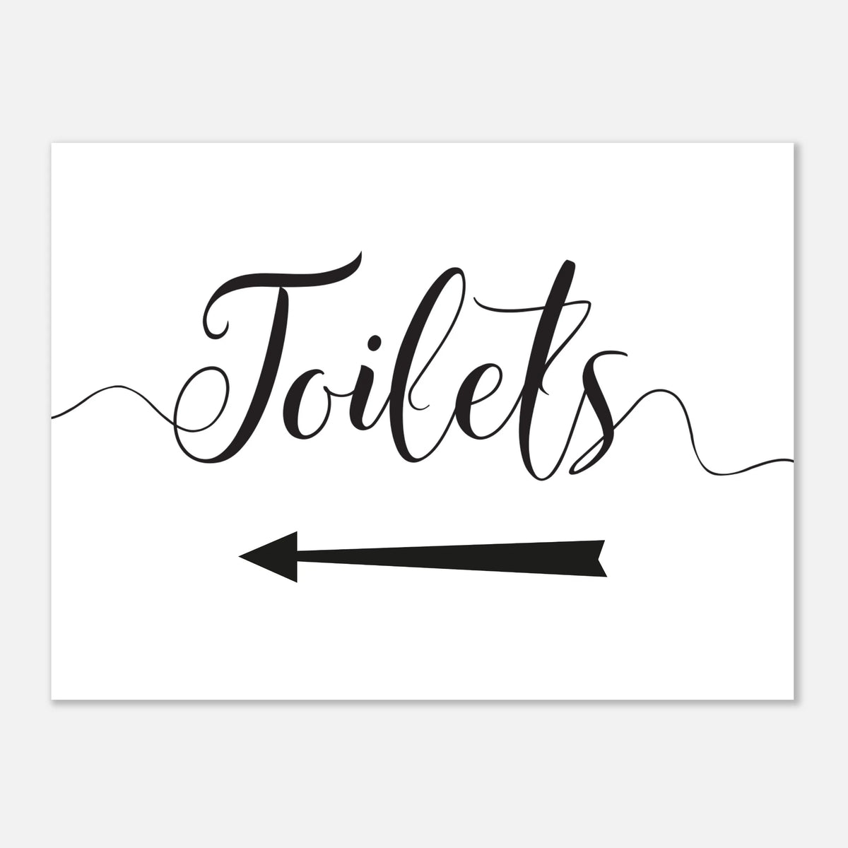 A white rectangular sign with the word "Toilets" in black cursive script and a black left-pointing arrow below, shown on a light gray background.