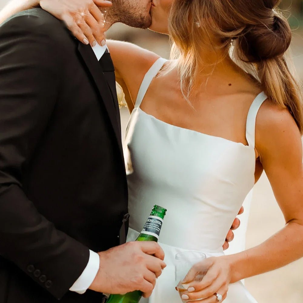 bride kissing groom wearing Classic A-Line Pleat Vintage Wedding Dress