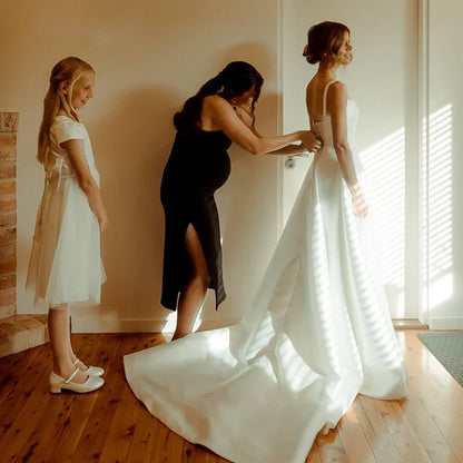 bride trying on Classic A-Line Pleat Vintage Wedding Dress