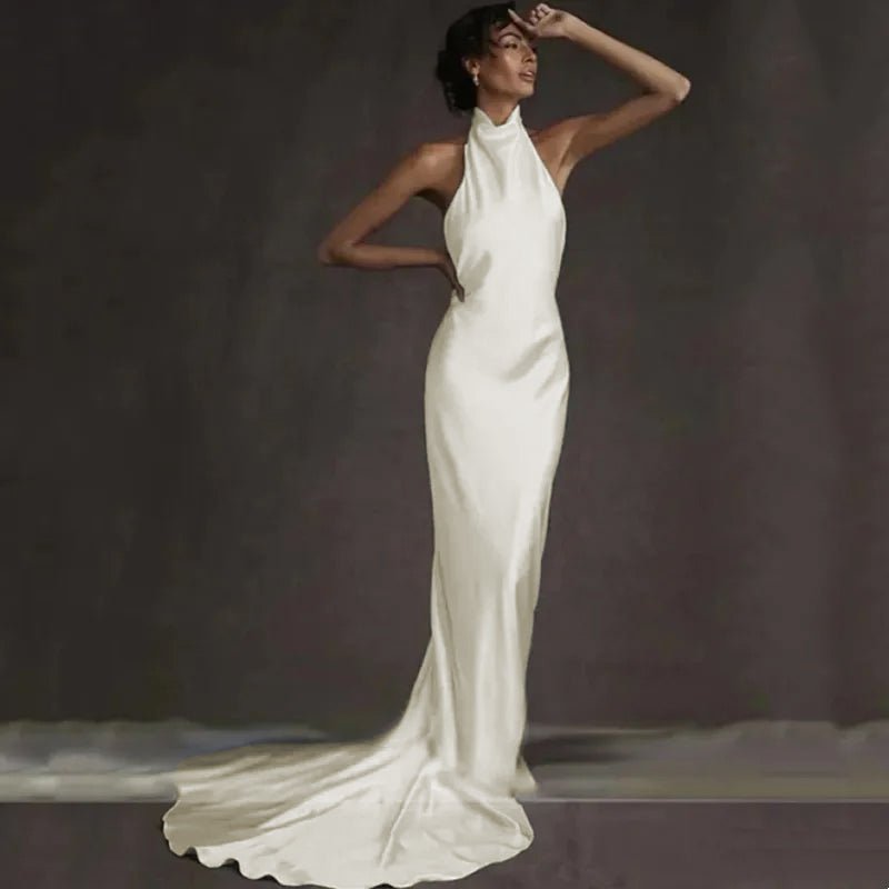 bride wearing an Ivory Backless Sleeveless Halter Neck Mermaid Wedding Dress