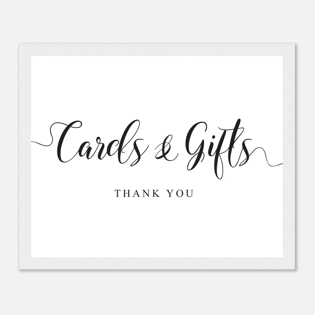 A minimalist white square sign or print with black script reading 'Cards & Gifts' and smaller text 'THANK YOU' below, shown against a light gray background.