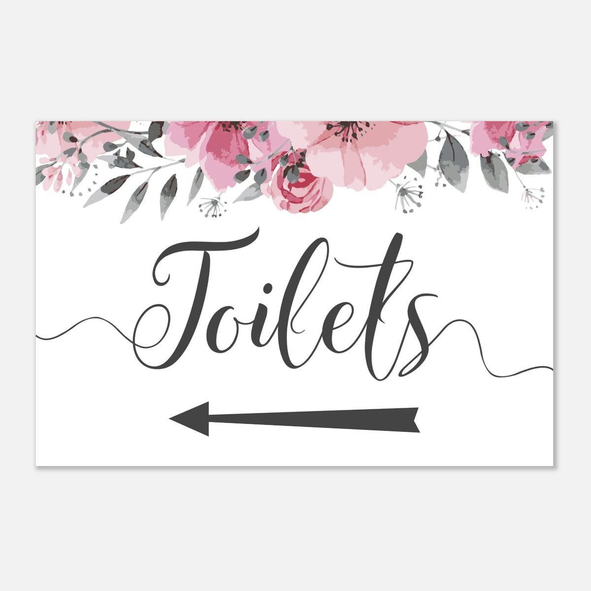 A rectangular white sign with pink watercolor flowers along the top, the word 'Toilets' in large black script, and a black arrow pointing left. The sign is shown on a light gray background.