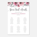 A wedding seating chart print with a watercolor floral header in pink and green, reading 'Your Seat Awaits' and 'to the wedding of Rebecca & Darren' with the date below, followed by 6 table names and attendee lists.