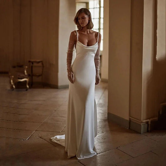 bride wearing an Elegant Satin Mermaid Wedding Dress with Pearls and Sweep Train