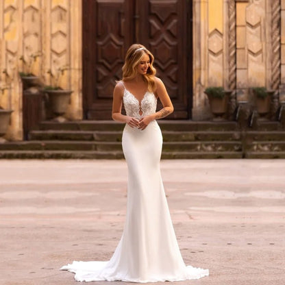 front view of a bride wearing a White Modern Satin Lace Embroidered Sleeveless Wedding Dress