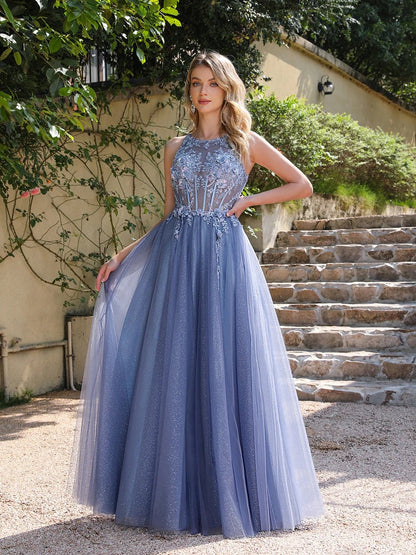 front view of girl outdoors holding Stunning Sparkling Blue Prom Dress