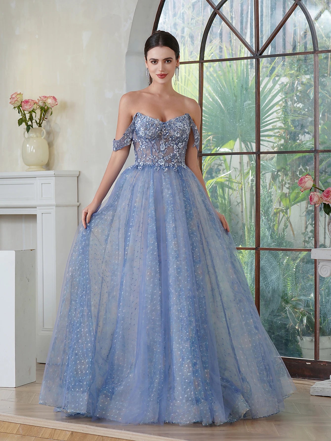 front view of prom girl wearing blue sparkling off-the-shoulder a-line dress