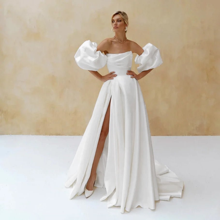 Full front view of a bride wearing an Elegant White A-Line Side-Slit Satin Wedding Dress with Puff Sleeves