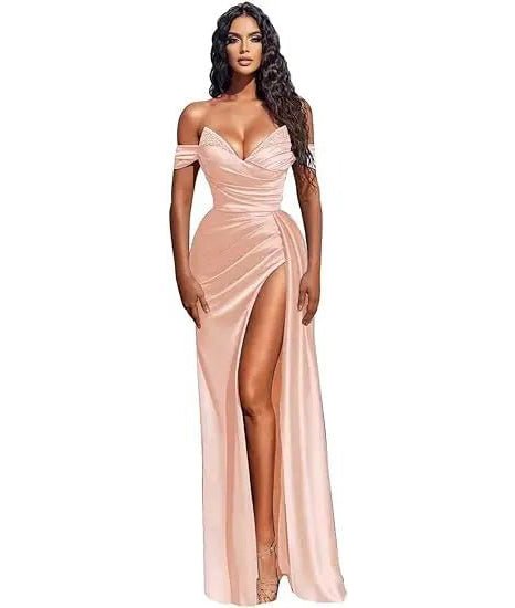 girl wearing a blushing pink off the shoulder beaded satin slit prom dress