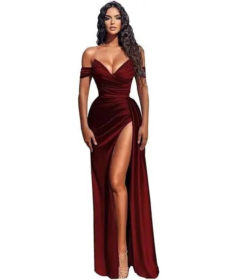 girl wearing a burgundy off the shoulder beaded satin slit prom dress