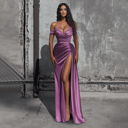 girl wearing a dusty purple off-the-shoulder beaded satin slit prom dress