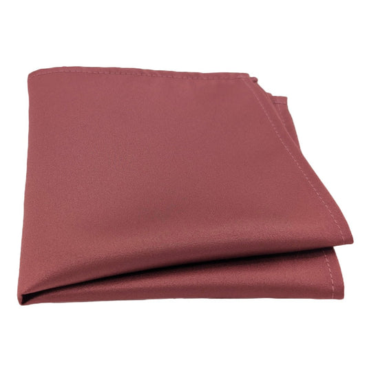 A single pocket square in a deep mauve colour, folded neatly.