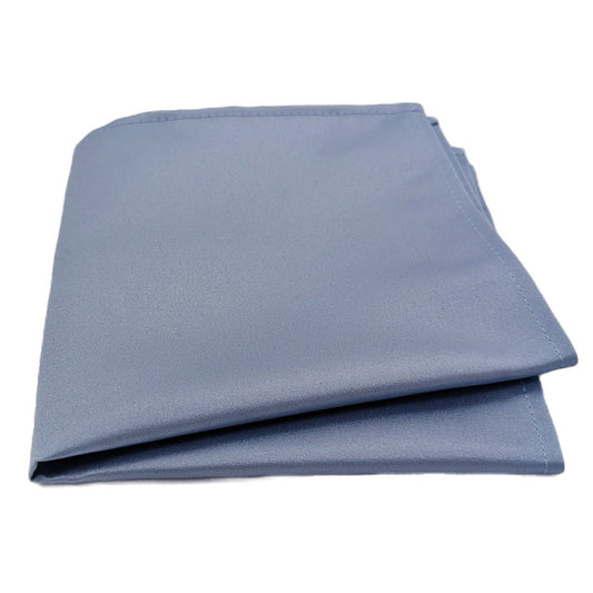 A pale blue pocket square folded flat, ready to be placed in a suit jacket pocket.