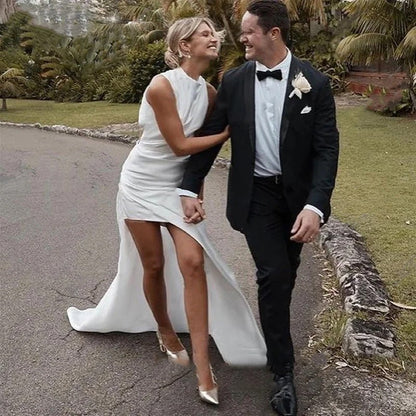 laughing bride and groom wearing a High Side Slit Satin Mermaid Wedding Dress