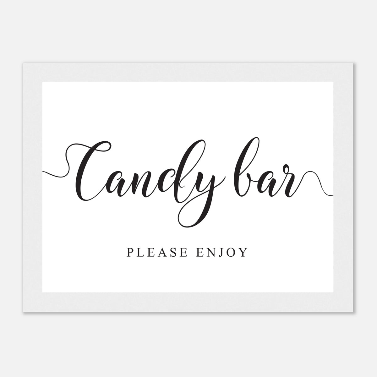 A white rectangular sign with a white border and black script text reading 'Candy bar' above smaller text 'PLEASE ENJOY', shown on a light gray background.