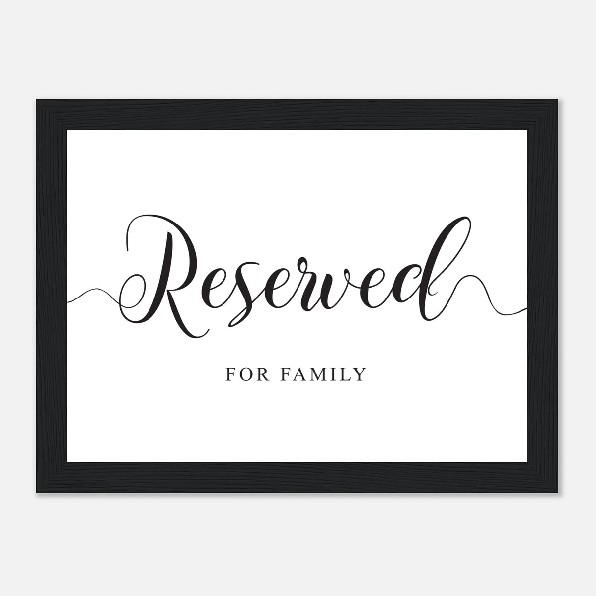 A framed black and white reserved sign with elegant script reading 'Reserved' and smaller text 'FOR FAMILY' below, shown against a light gray background.