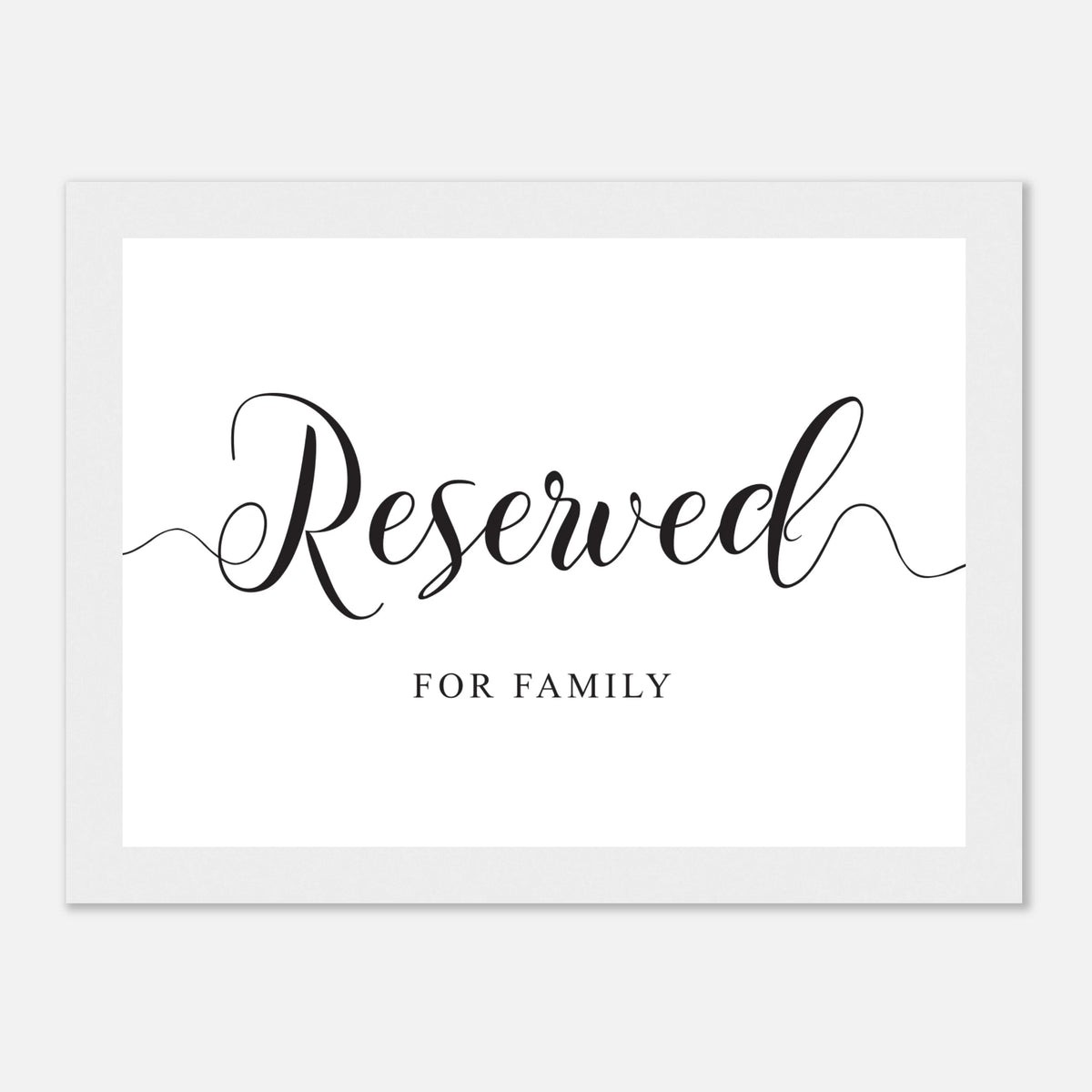 A reserved family sign with elegant black script reading 'Reserved' and smaller text 'FOR FAMILY' below, shown on a white cardstock with a wide white border against a light gray background.