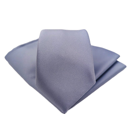 A pale blue necktie and matching pocket square set, neatly folded on a white background.