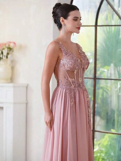 side view of a girl wearing a pink luxury backless beaded a-line prom dress