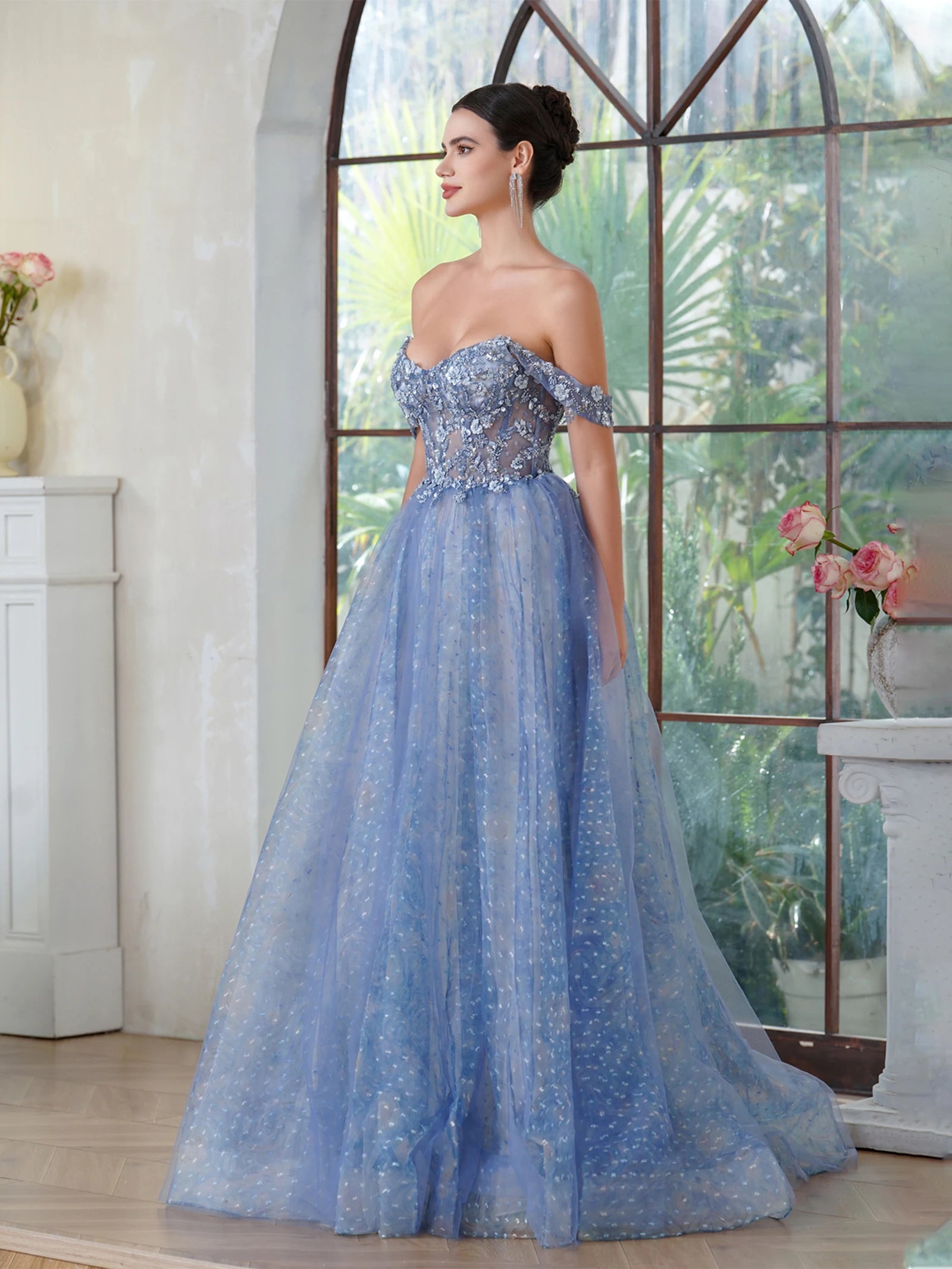 side view of prom girl wearing blue sparkling off-the-shoulder a-line dress