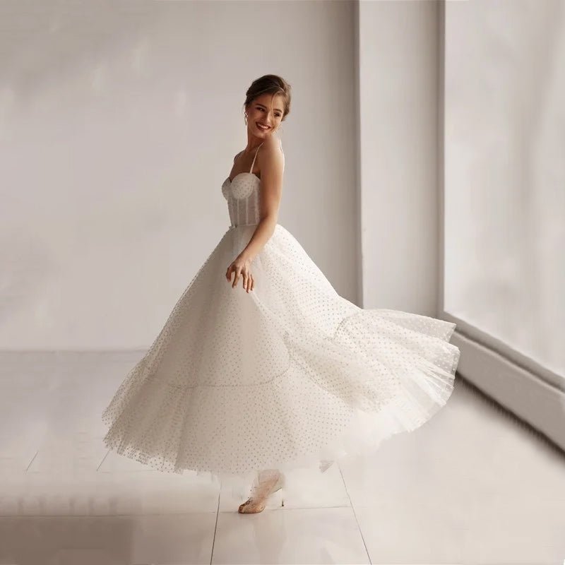 sideways view of bride wearing Ankle-Length Lace-Up Backless Wedding Dress