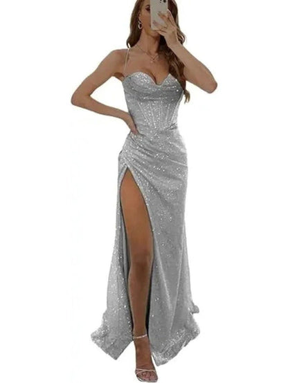 silver sequined thigh slit prom dress with spaghetti straps