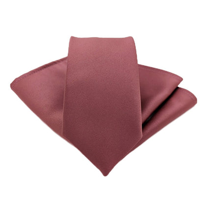 A deep mauve coloured tie and pocket square set.