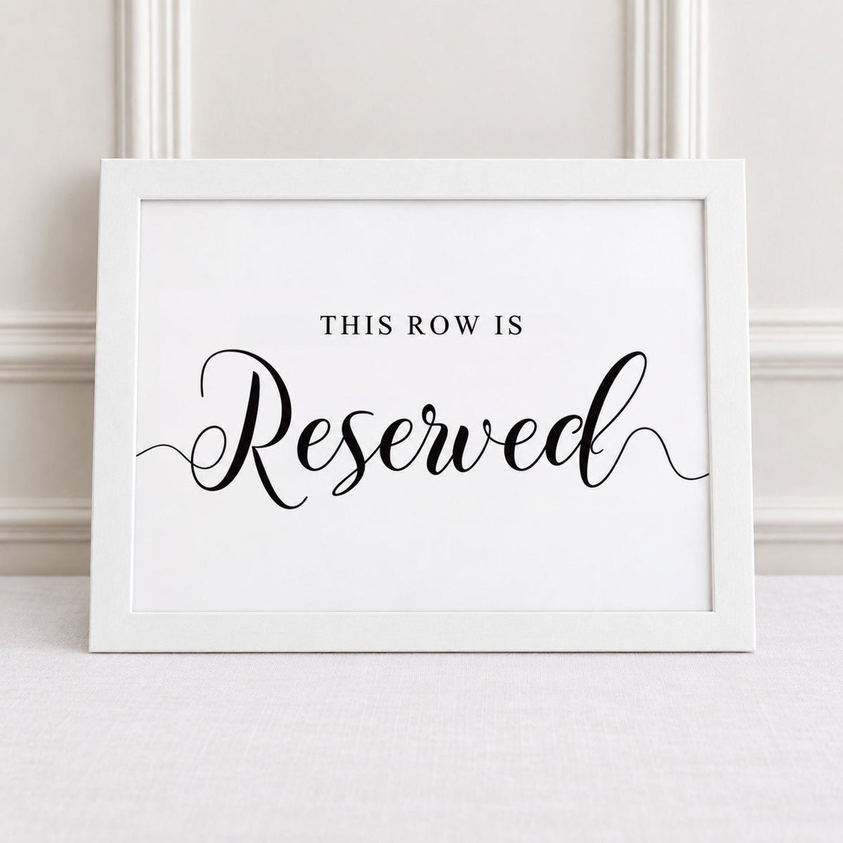 this row is reserved white framed sign