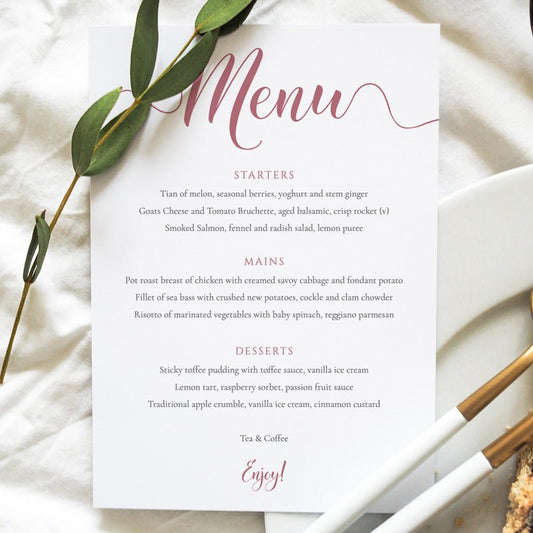 3 course pastel pink wedding menu on a wedding table