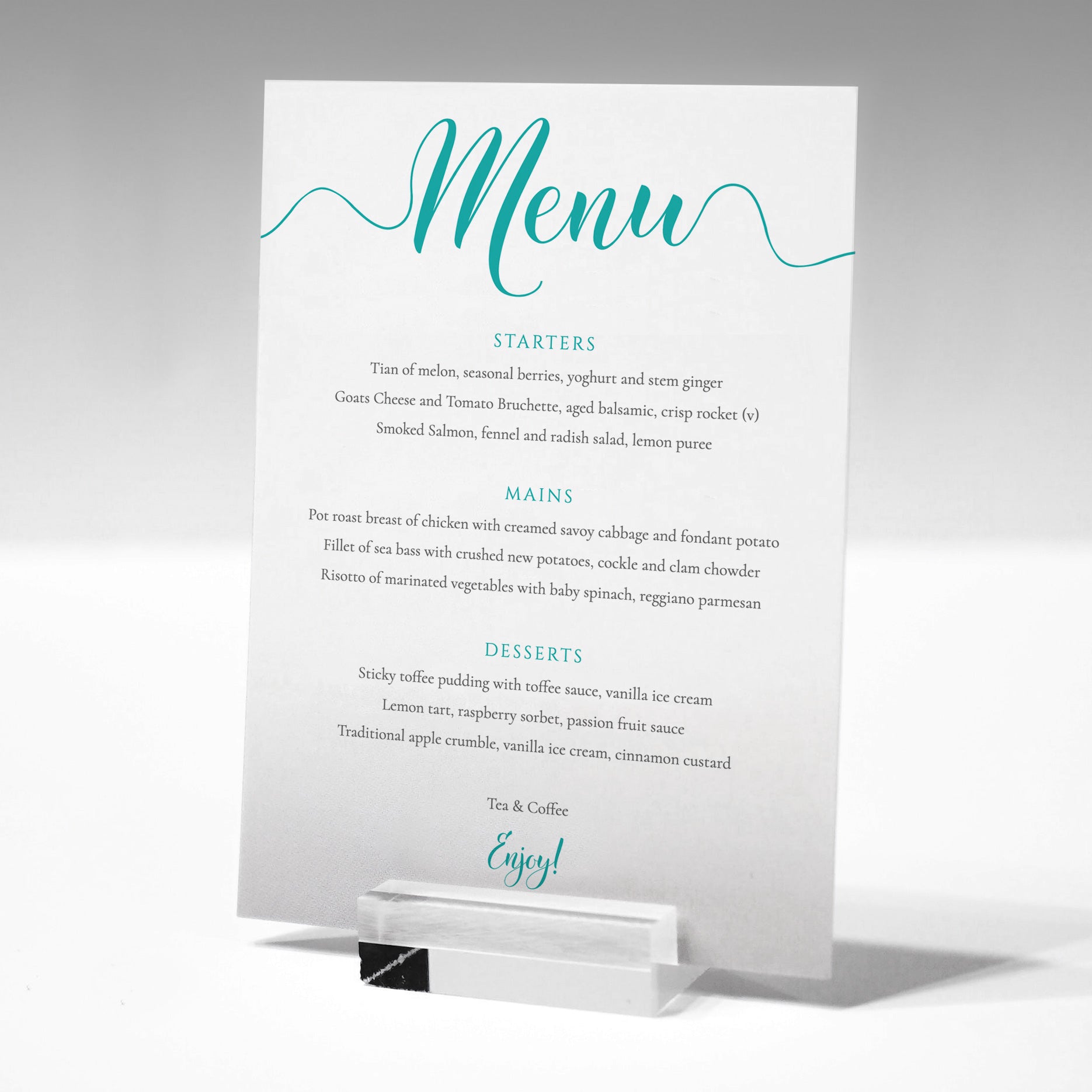 3 course turquoise menu card in a glass menu stand