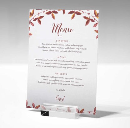 5x7 autumn reds, oranges and browns table menu in a glass stand