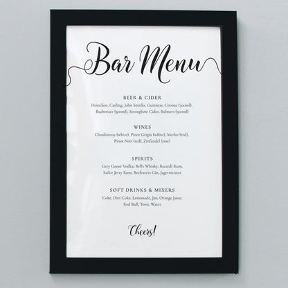 8x10 wedding bar menu in a black frame on the wall