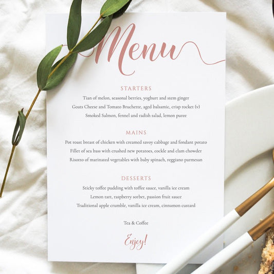 5x7 rose gold menu card on a wedding table