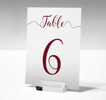 7x5 burgundy table number printed on card in a glass stand