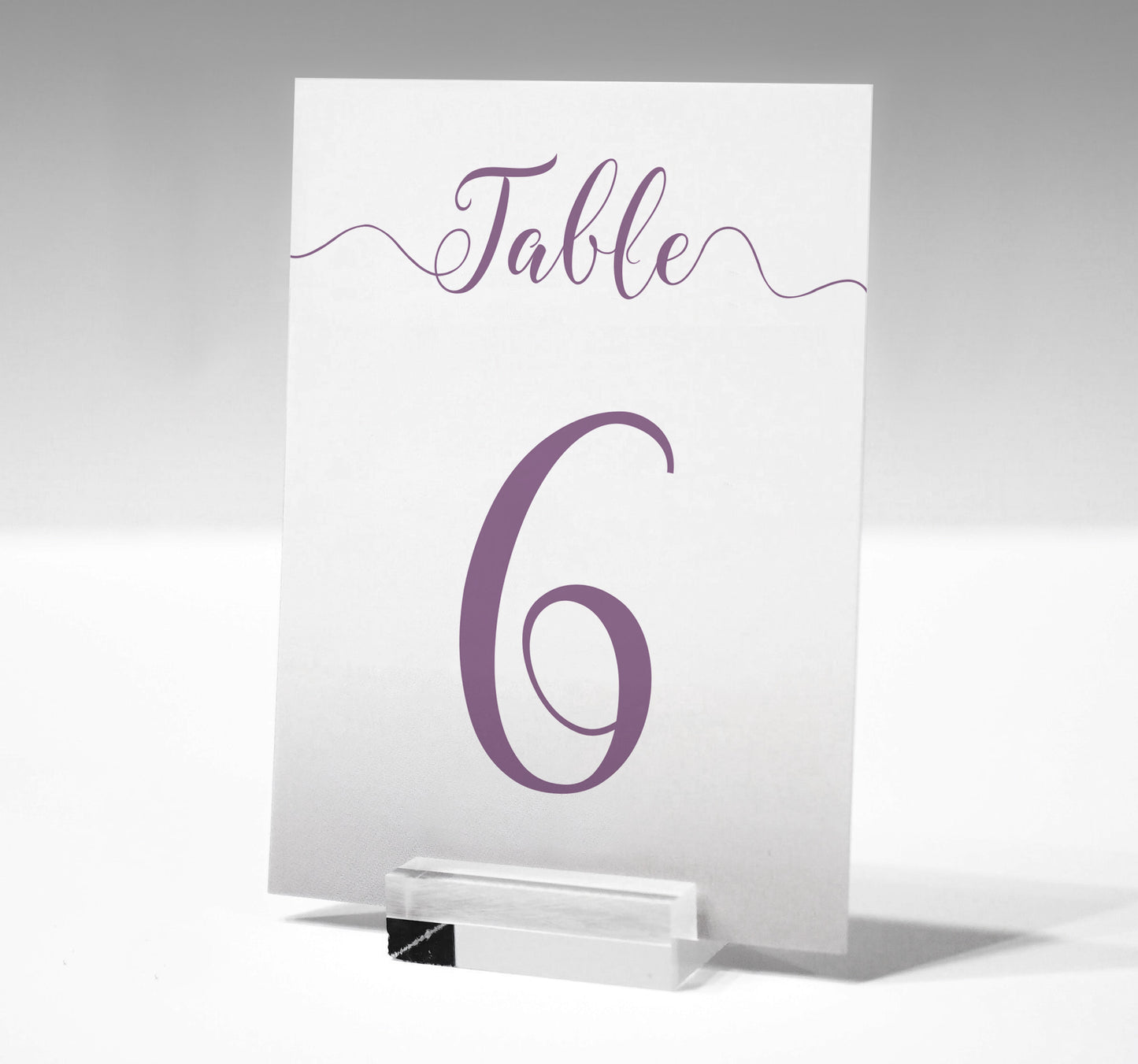 7x5 purple table number printed on card in a glass stand