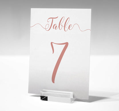 7x5 rose gold table number printed on card in a glass stand