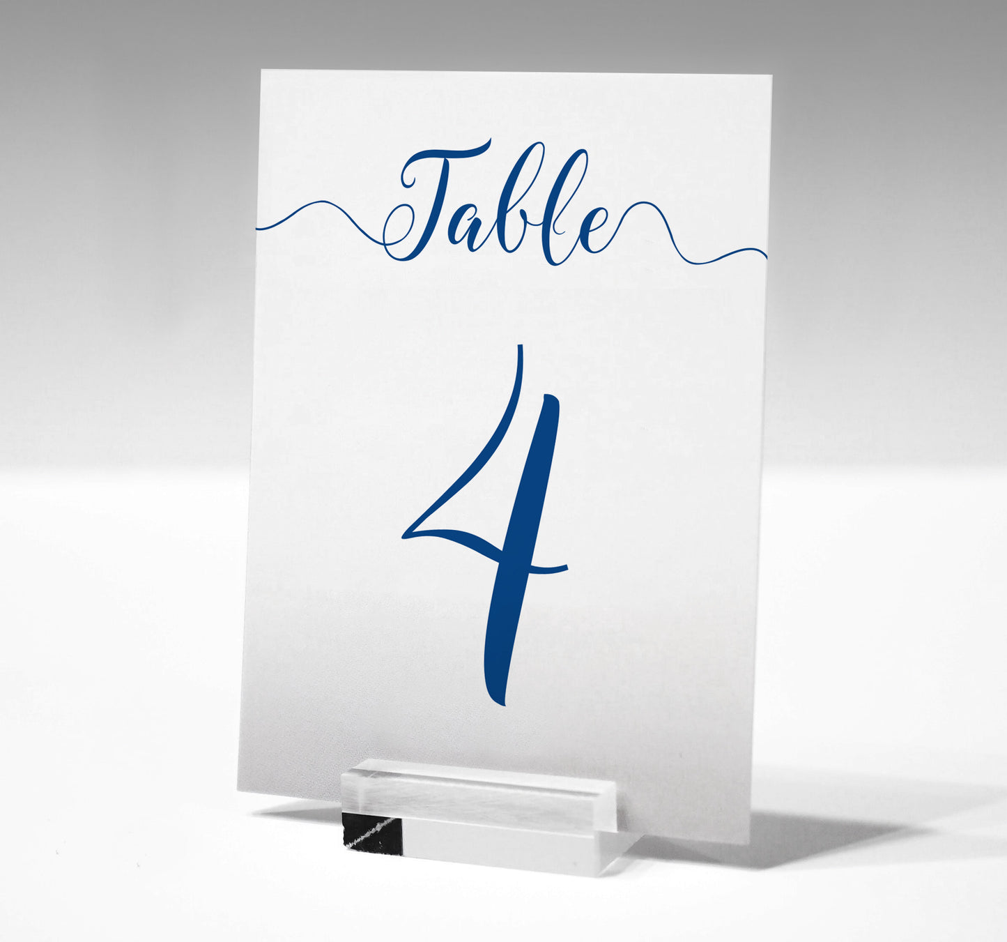 7x5 royal blue nautical table number printed on card in a glass stand
