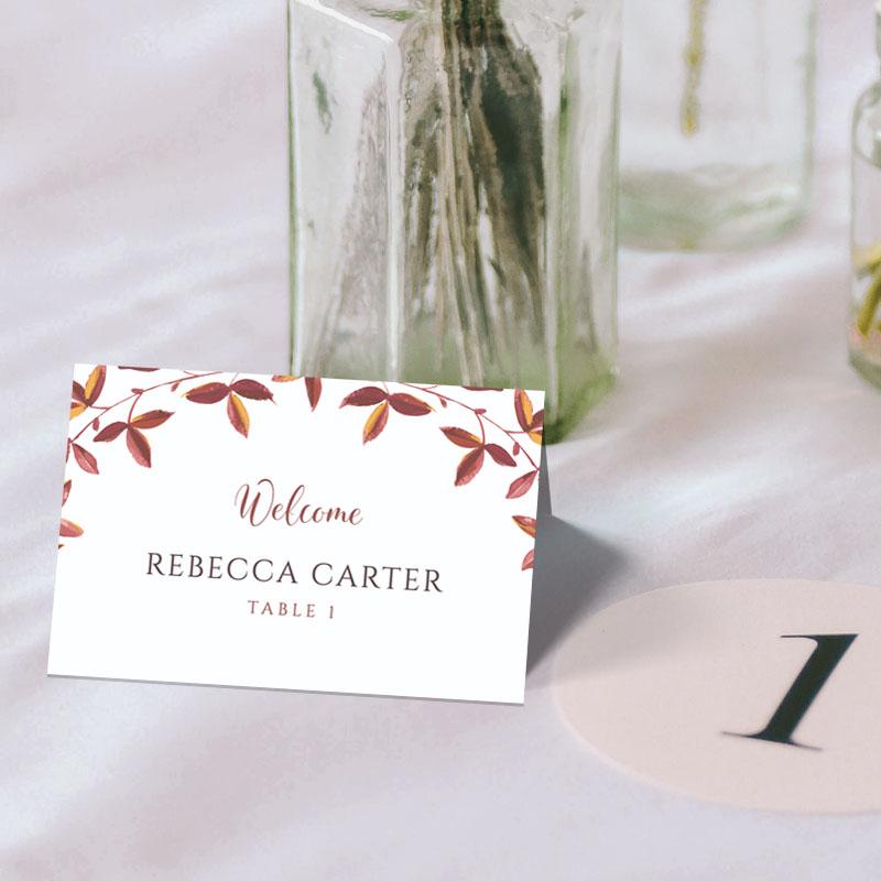 autumn theme folded name card on a wedding table