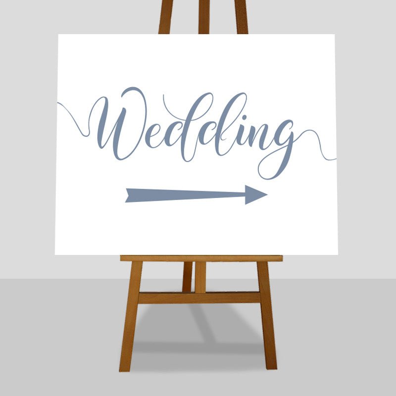 baby blue wedding arrow sign on easel