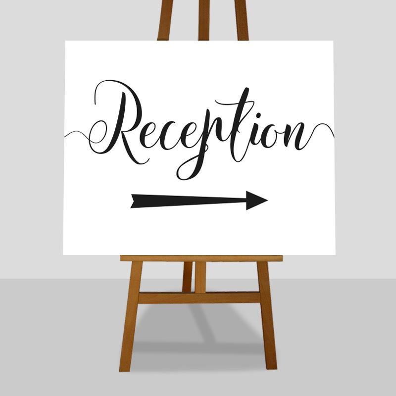 wedding reception sign with a directional arrow
