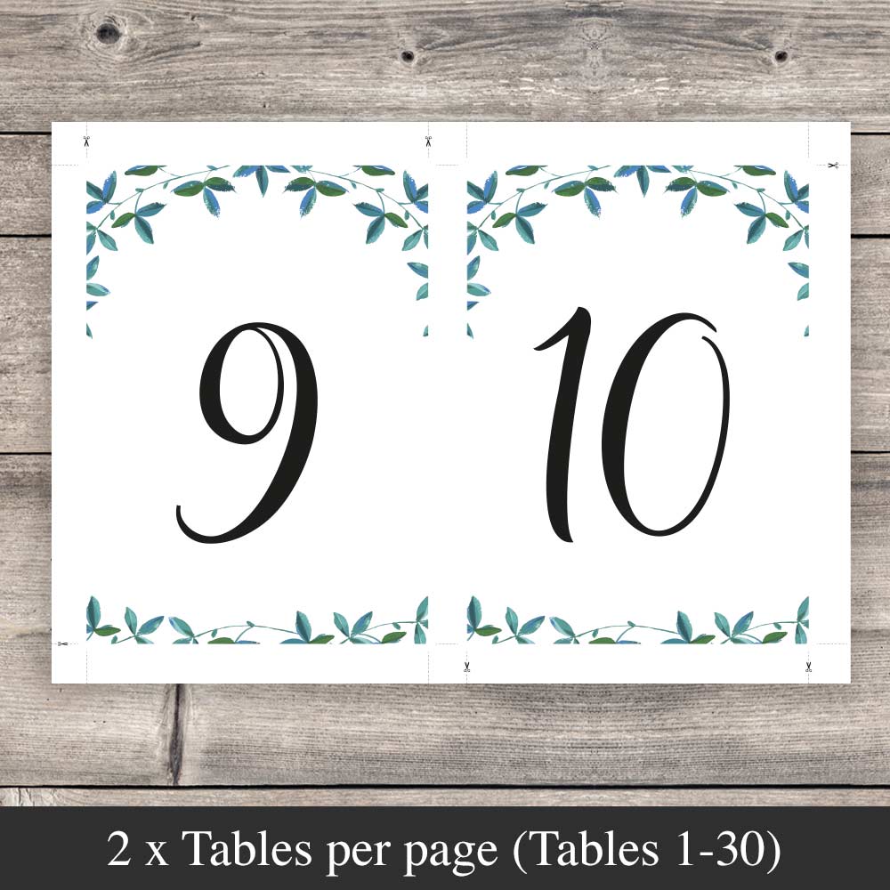 2 table numbers on a sheet ready to download and print on a rustic wood background