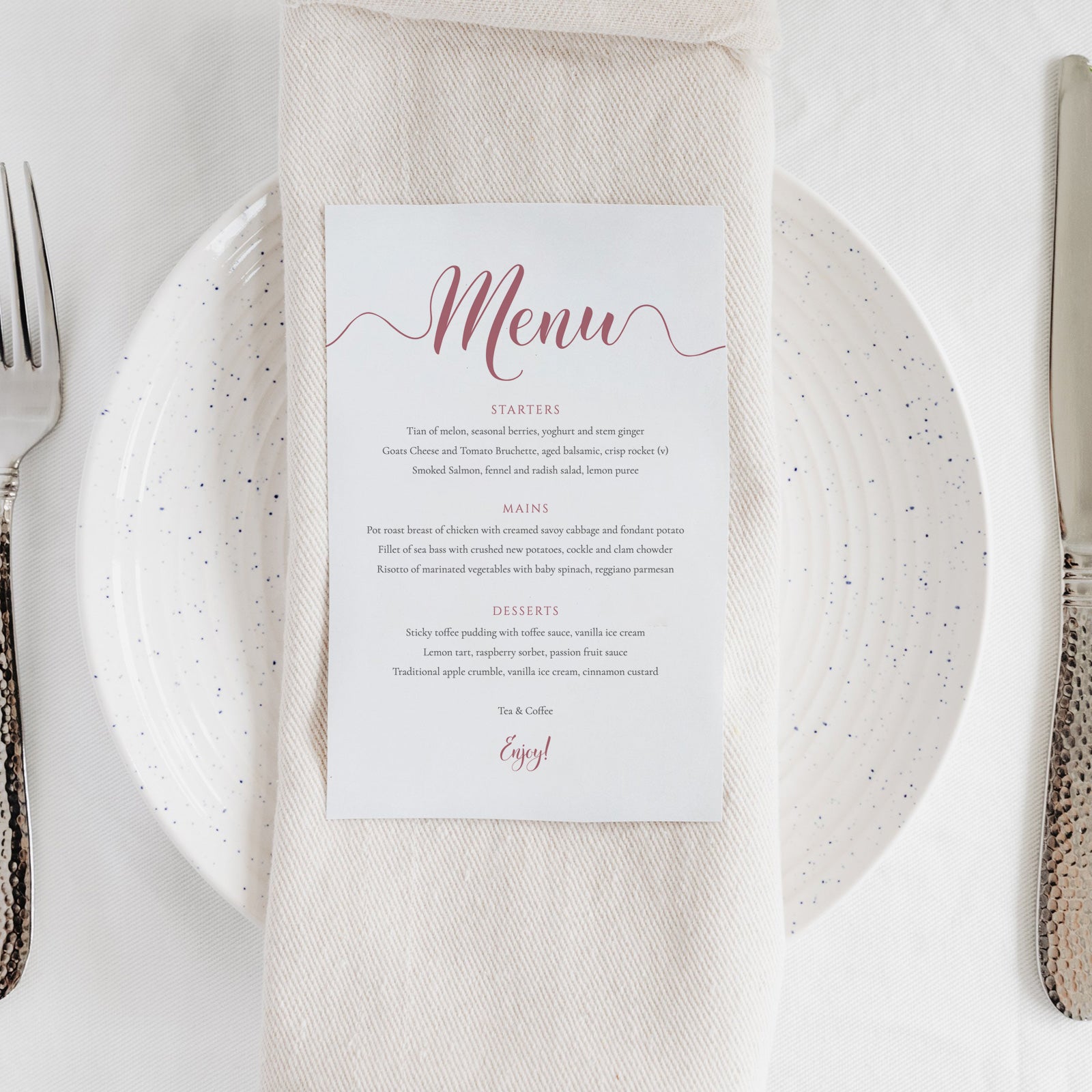 blush pink wedding menu card on a plate