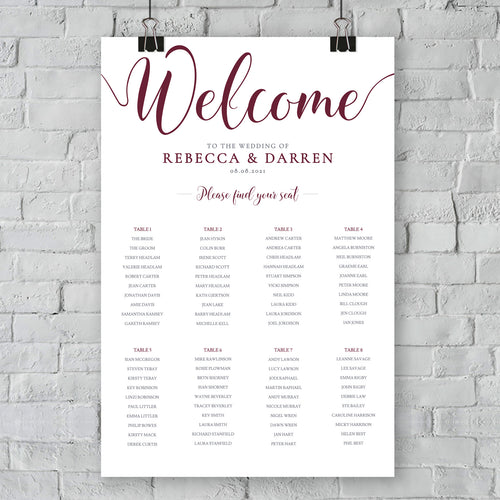 burgundy seating chart against a brick wall