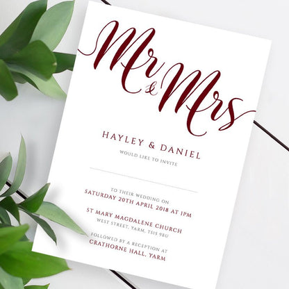 burgundy wedding invitation template on a white table