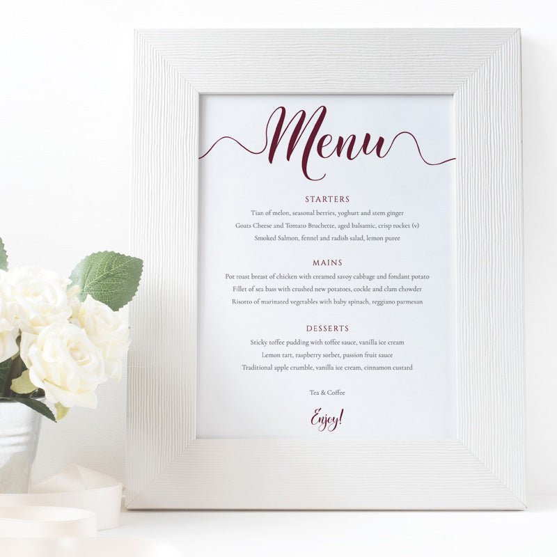 burgundy wedding menu card in a white frame