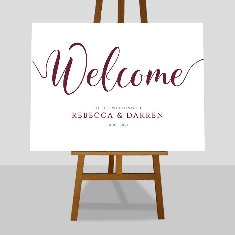 burgundy wedding welcome sign on an easel
