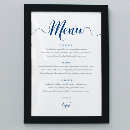 cobalt blue wedding menu in a black frame