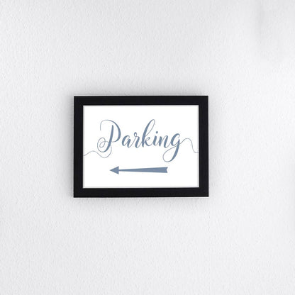 dusty blue directional parking sign with arrow pointing left