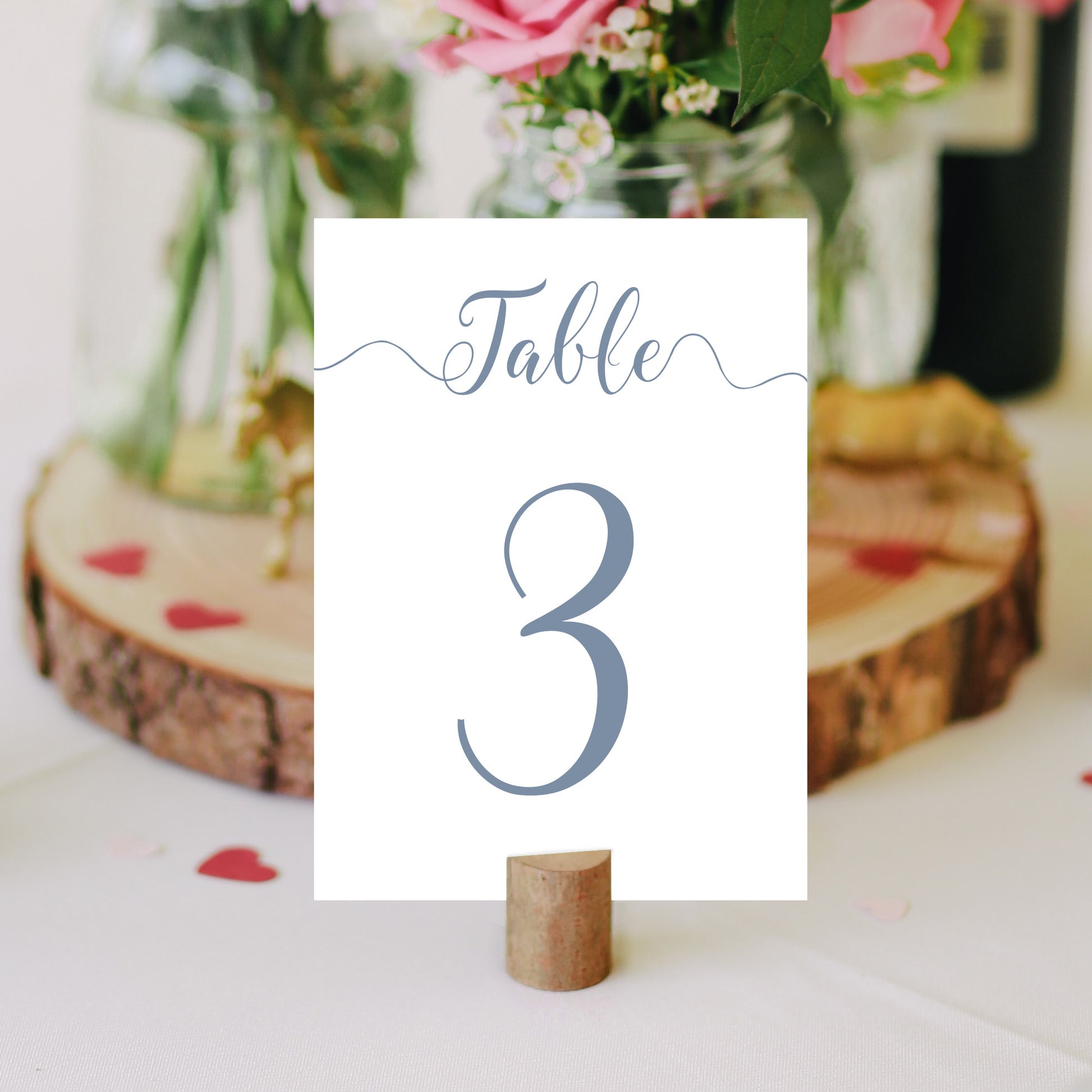 dusty blue table number on a wedding table