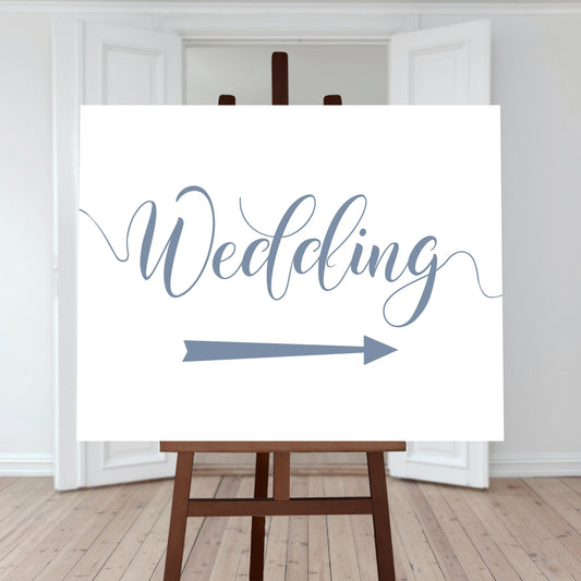 dusty blue wedding directions sign with a right arrow
